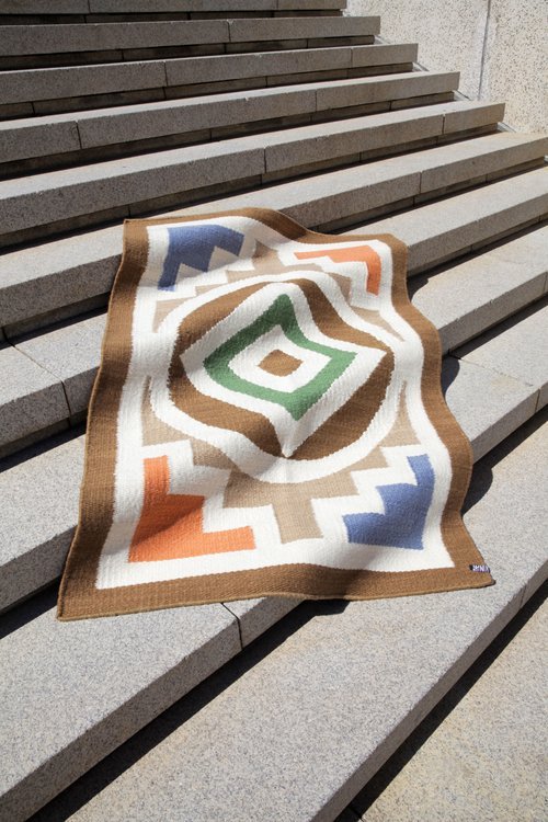 colorful patterned ethical rug from the Ninevites