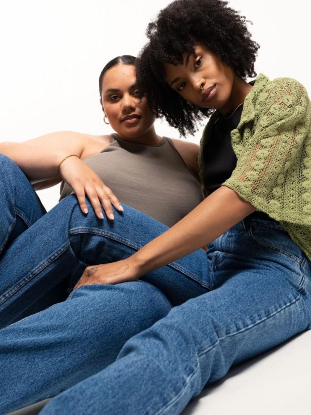 two women wearing size inclusive denim from unspun