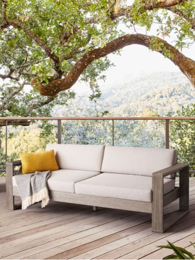 white and gray sustainable outdoor sofa on patio