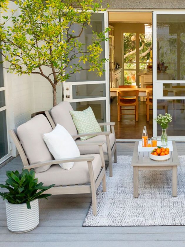 beige sustainable outdoor chairs and wooden sustainable outdoor patio table from Yardbird